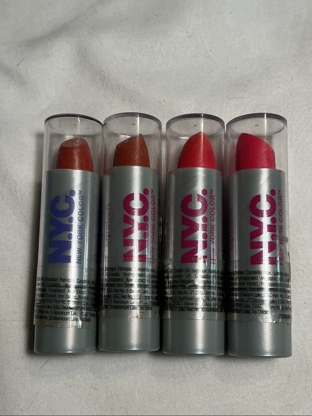 NWT NYC Lipstick Set - Coral, Orange-Brown, Bright Red & pink discontinued color